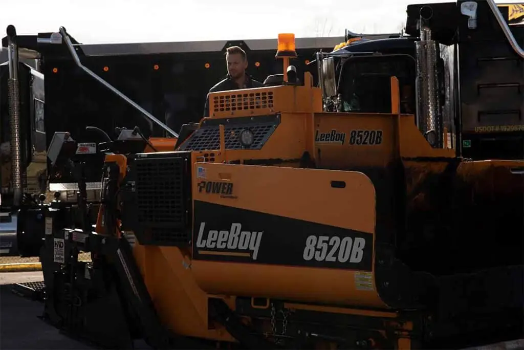 Belcher Grady Operating Paving Equipment